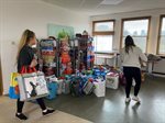 image of two people with food boxes